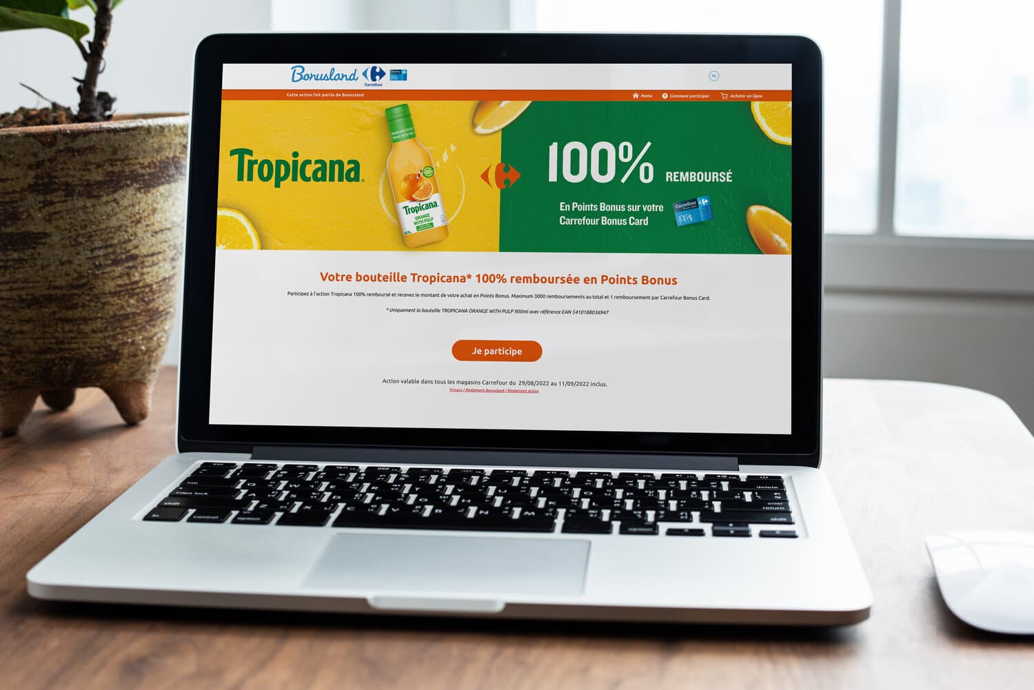 Laptop showing the Bonusland Carrefour page with the Tropicana 100% refunded offer